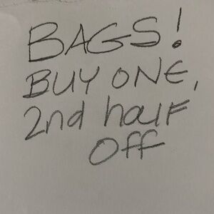 Bags buy one , 2nd half off